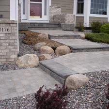 Traditional Walkway with white and glass door