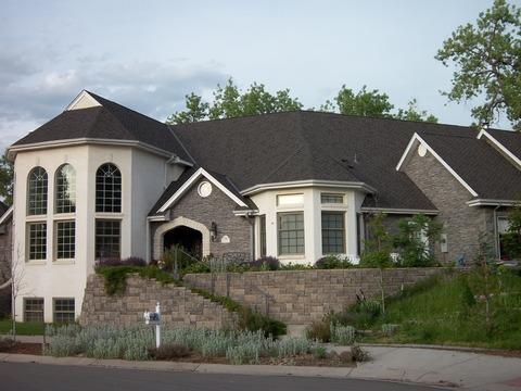 Modern Home Exterior with black asphalt shingle roof