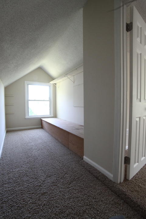 Traditional Closet with white floor molding
