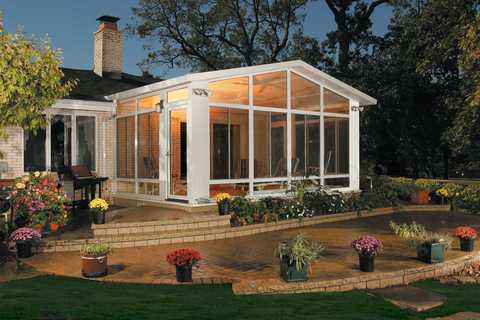 Traditional Sunroom with wall to wall windows