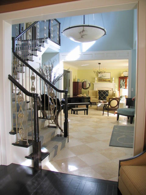 Modern Entry with blue and white striped stair runnger