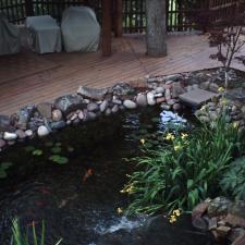 Transitional Landscape with an amazing split level fish pond