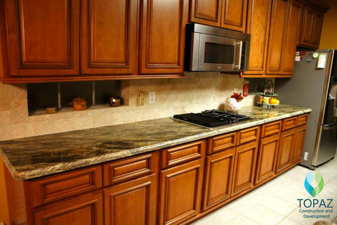 Transitional Library with diamond pattern ceramic tile backsplash