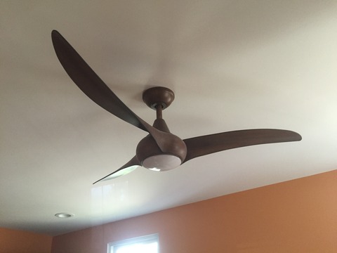 Art Deco Bedroom with propeller style ceiling fan and light