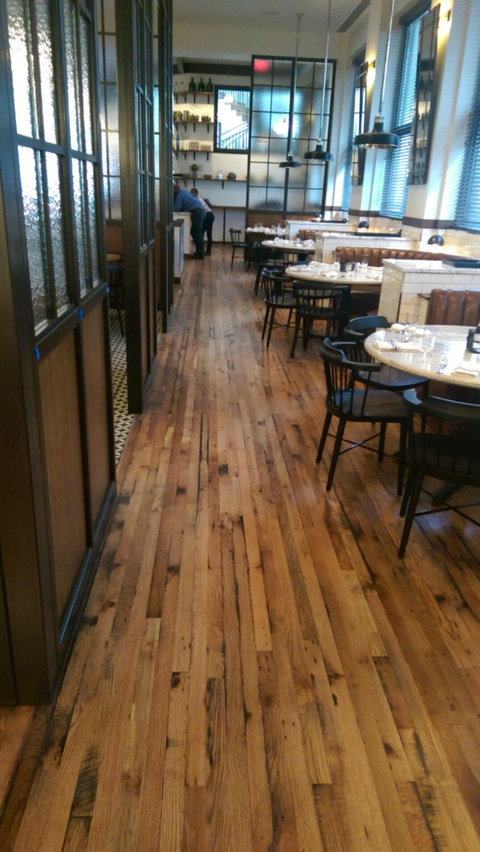 Eclectic Dining Room with narrow plank wood floor