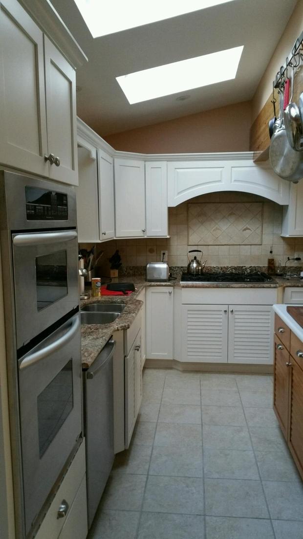 Contemporary Kitchen In New Brunswick Cottage Pot Rack By Contemporary Kitchen In New Brunswick