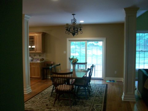 Transitional Dining Room with wrapped support post