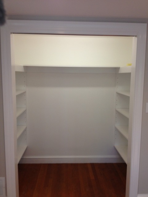 Traditional Closet with melamine closet shelves
