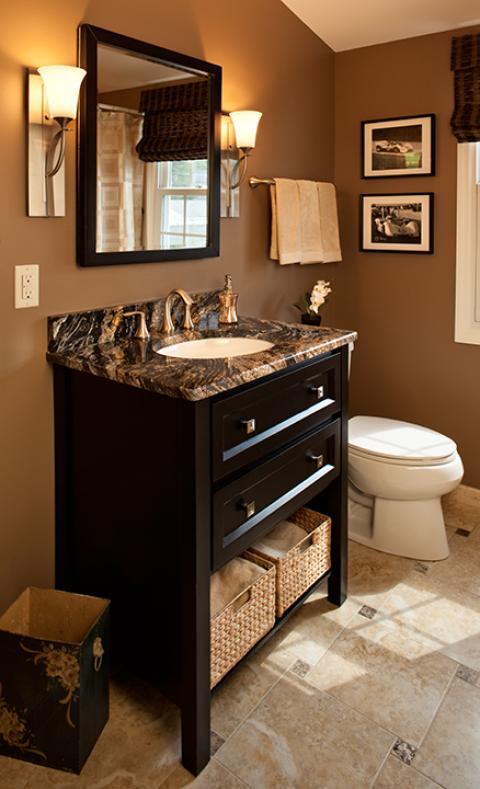 Traditional Bathroom with brown and black roman style shades