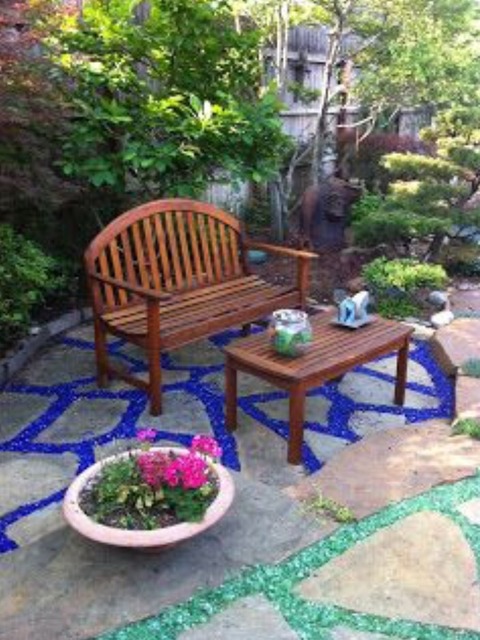 Eclectic Landscape with teak wood garden bench