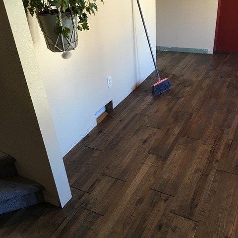 Modern Entry with engineered hardwood flooring