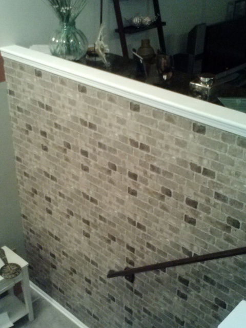 Modern Entry with vinyl wallpapered wall