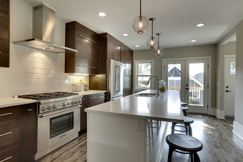 Modern Kitchen with stainless steel side by side refrigerator