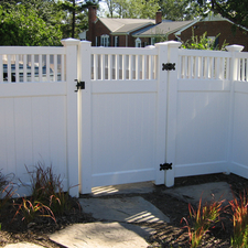 Modern Landscape with modern picket top fence