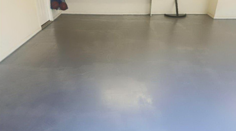 Transitional Garage with gray painted concrete floor