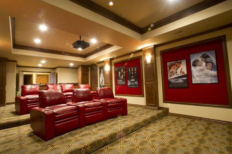 Traditional Home Theater with red leather recliner