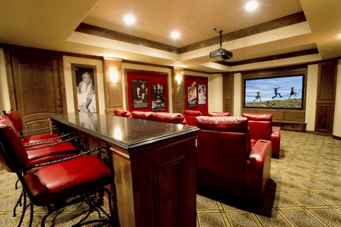 Traditional Home Theater with red leather recliner