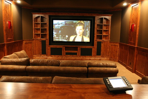 Traditional Home Theater with built in cabinetry