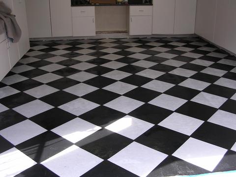 Eclectic Garage with faux black and white tile