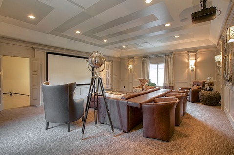 Eclectic Home Theater with ceiling mount movie projector