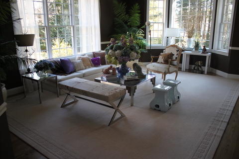 Eclectic Family Room with cow hide upholstered chair