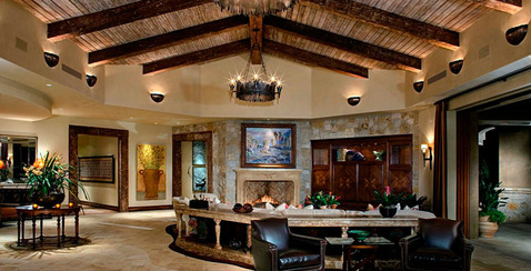 Eclectic Family Room with herringbone pattern stone tile fireplace surround