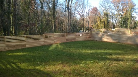 Modern Landscape with 4 foot horizntal slat and plank fence