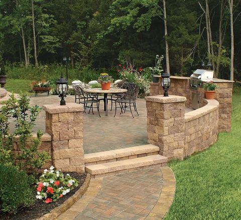 Traditional Patio with iron and stone patio furniture