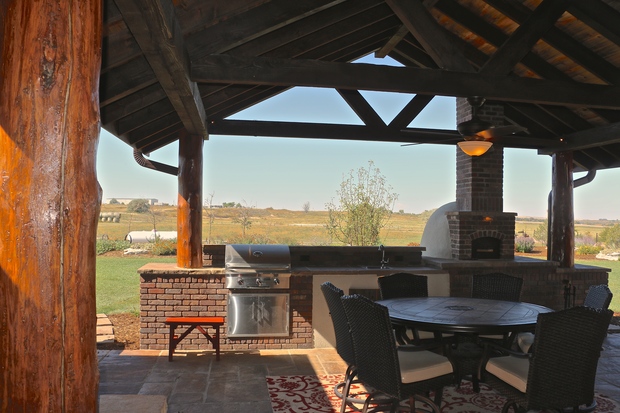 Southwestern Outdoor Kitchen with rustic wood support post
