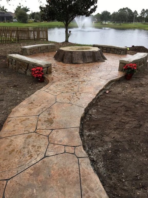 Eclectic Patio with stamped concrete flagstone walkway