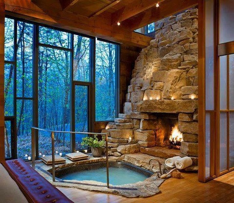 Eclectic Family Room with stacked stone fieplace surround