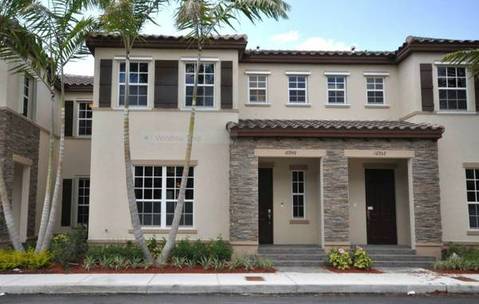 Mediterranean Home Exterior with interior divided windows