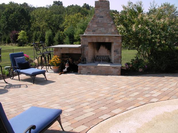 Traditional Patio with black metal bar chairs