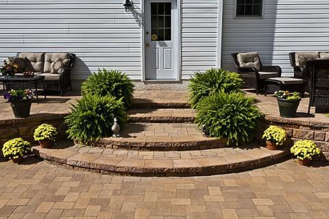 Traditional Patio with black wicker patio furniture