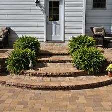 Traditional Patio with black wicker patio furniture