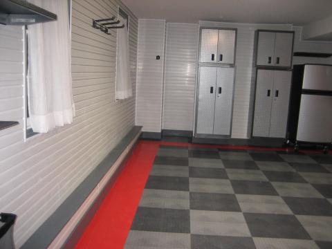 Contemporary Garage with white siding in interior of garage