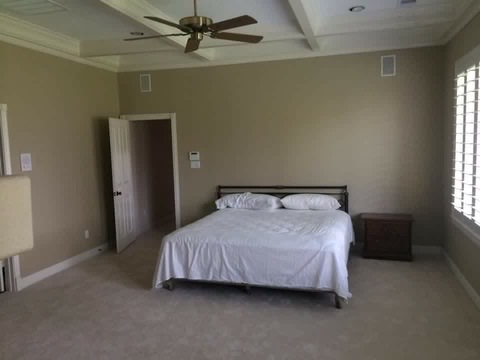 Transitional Bedroom with paneled white door