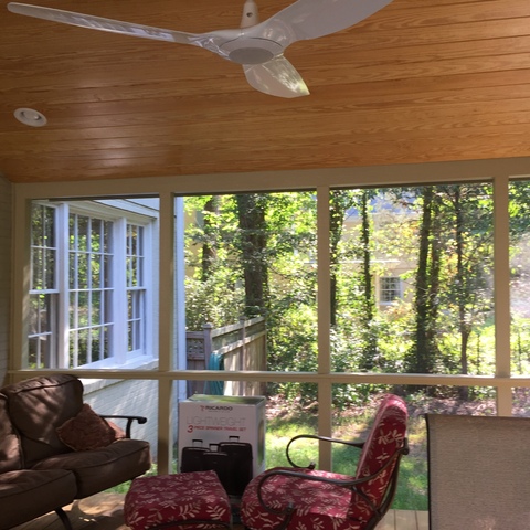Contemporary Sunroom with propeller style ceiling fan and light