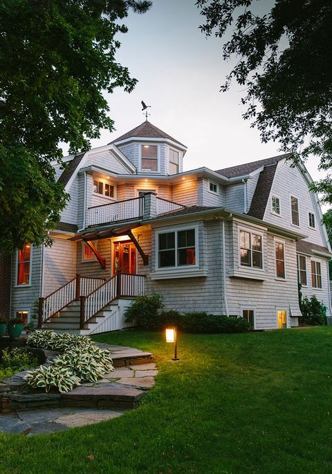 Eclectic Home Exterior with gray exterior paint