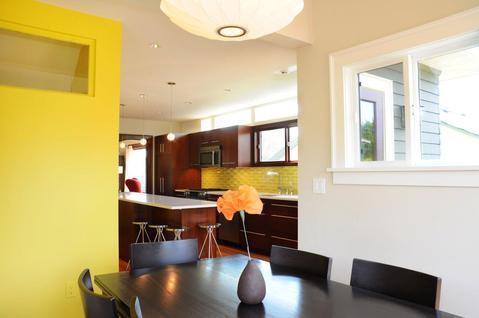 Modern Dining Room with white ceiling hung lighting