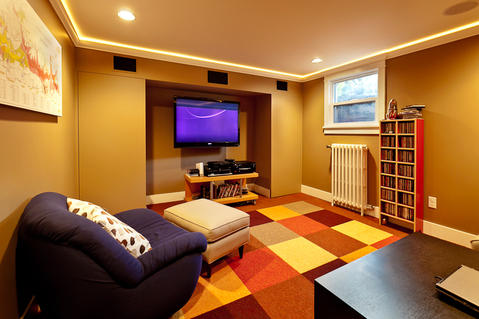 Modern Basement with basement family room with wall mounted tv