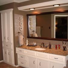 Traditional Master Bathroom with brown tile flooring