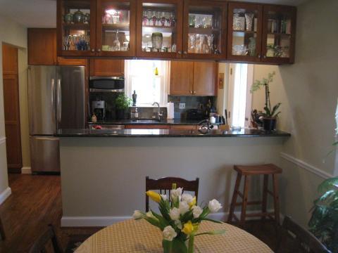 Traditional Kitchen with white framed windows and doors