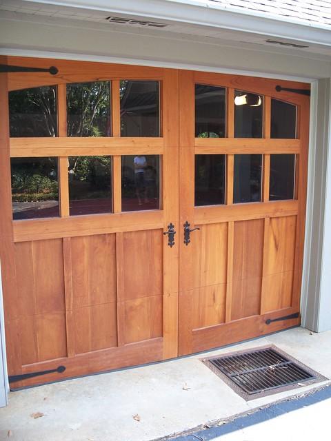 Contemporary Garage with cement paved garage floor