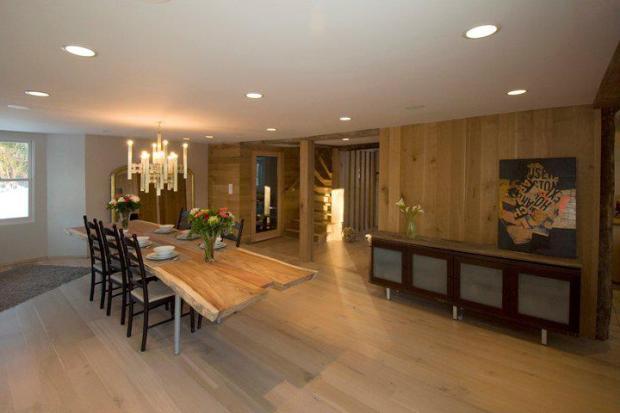 Contemporary Dining Room with light wood panel wall covering