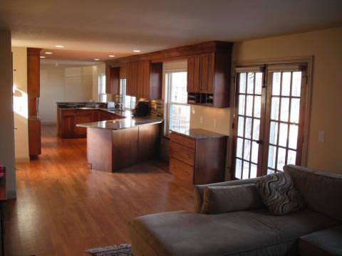 Contemporary Family Room with cabinet crown molding
