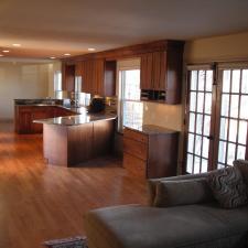 Contemporary Family Room with cabinet crown molding