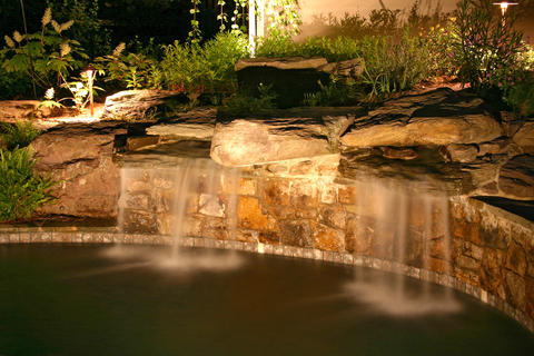 Traditional Pool with landscape lighting
