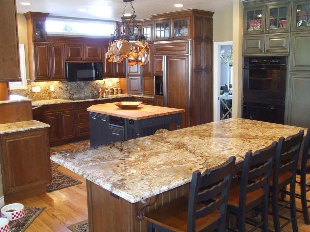 Traditional Kitchen with cabinet front refrigerator