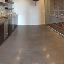 Contemporary Wine Cellar with frameless glass doors